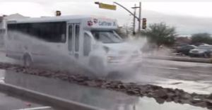 bus splashing puddles